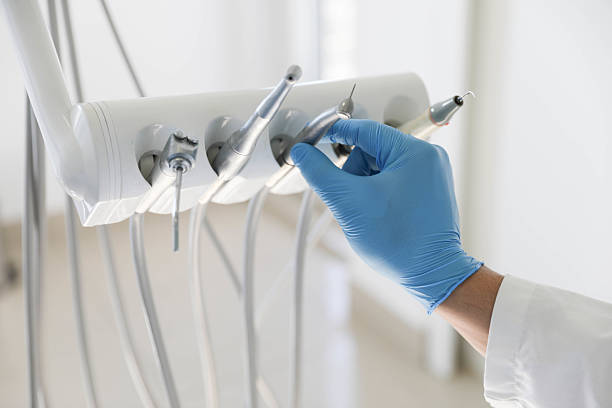 Professional Root Canal Treatment technician working in Key Center, WA